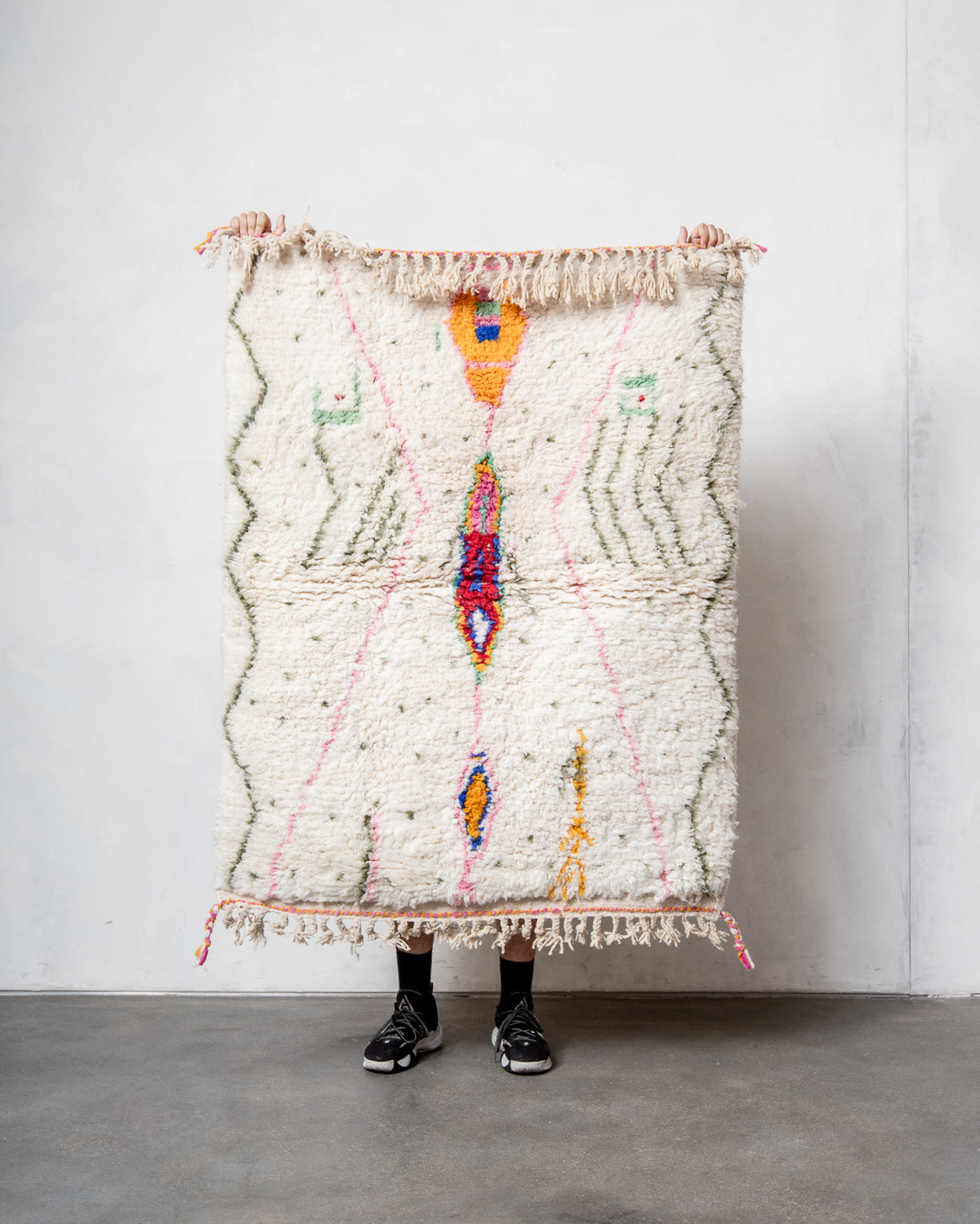 Modern, designer, handcrafted Berber rug from Morocco. Beniourain carpet with beautiful colours and patterns and fluffy wool texture.